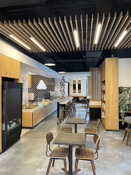 Inside Compilation Coffee Roasters — bright, wood-lined café in Fort Greene